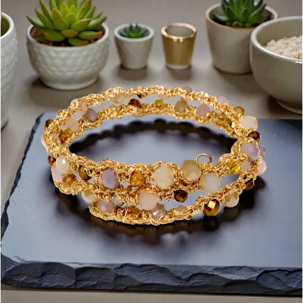 Bracciale handmade a molla Sole di Champagne, due giri con cristalli sfaccettati rosa e ambra