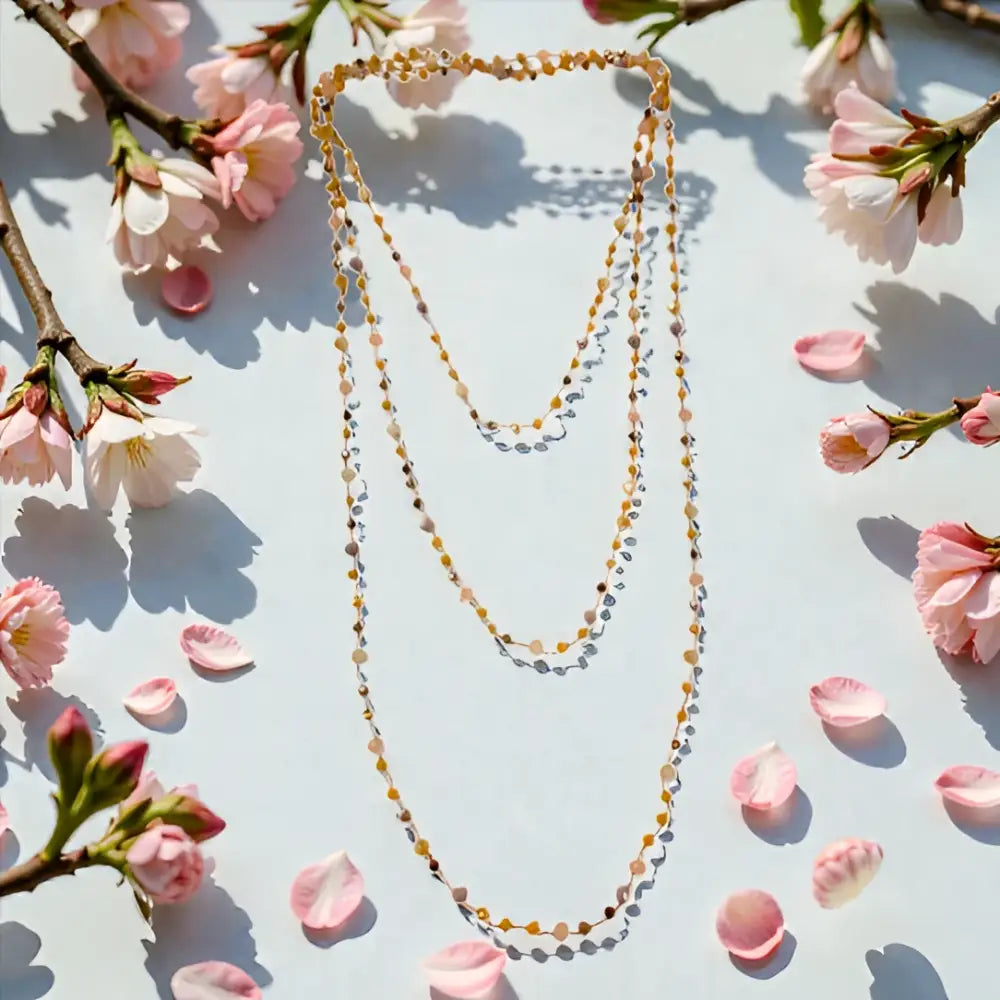 Collana handmade Aurora Tre Giri con perline oro rosa sfaccettate