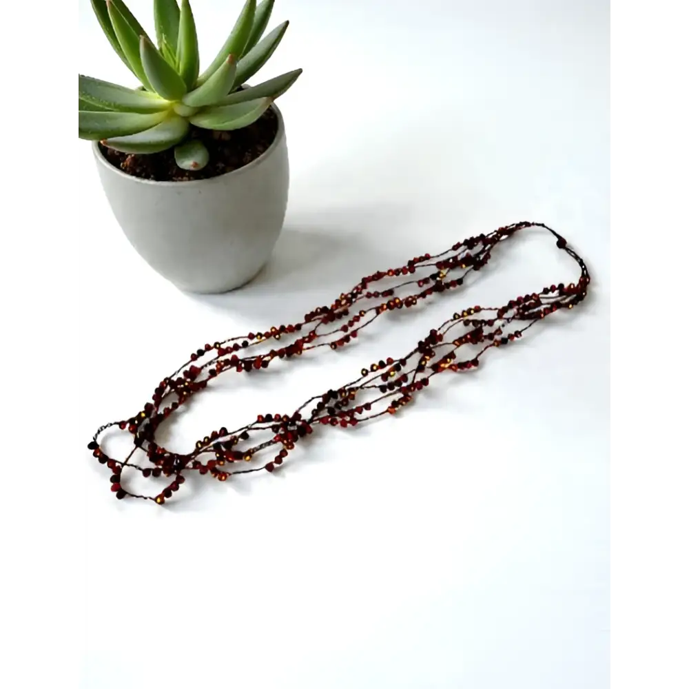 Collana handmade Edera Notturna con cristalli rosso vino e champagne