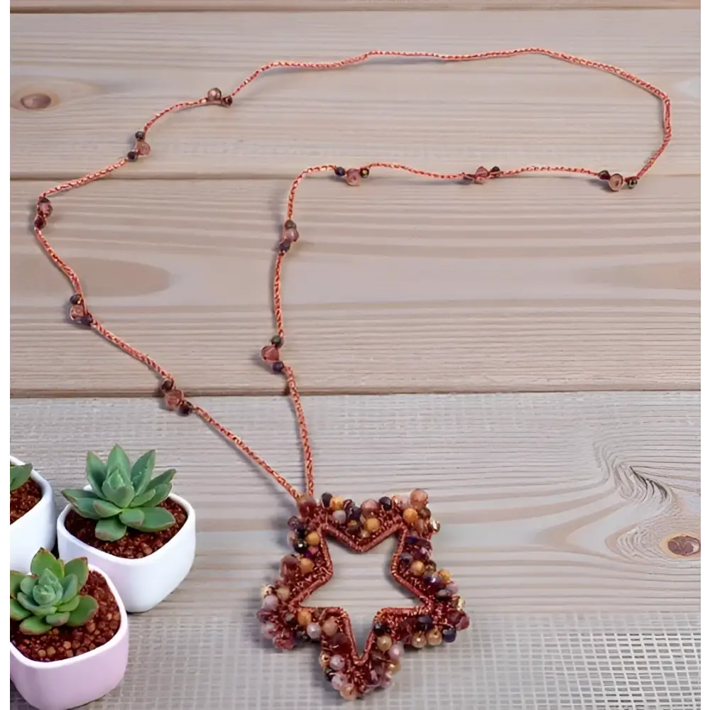 Collana Stella Aurea artigianale in rame con pendente stellare sfaccettato