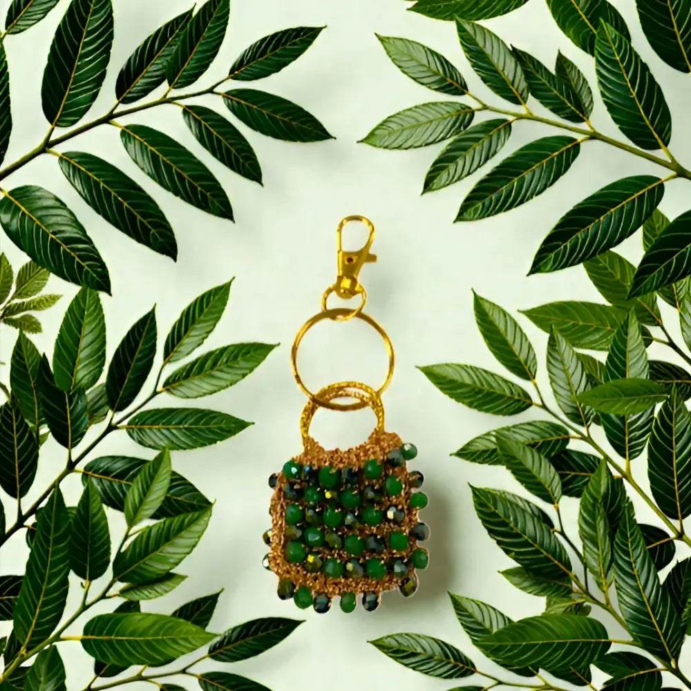 Portachiavi handmade pochette di luce con cristalli sfaccettati verdi delicati